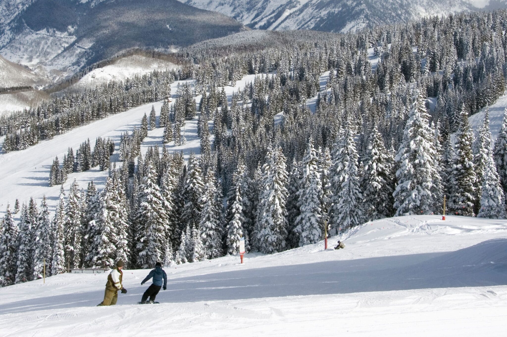 Skiing in Colorado vs. Camping in Hawaii