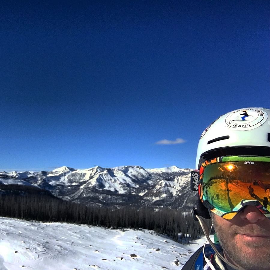 Skiers enjoying a picturesque ski slope in Colorado
