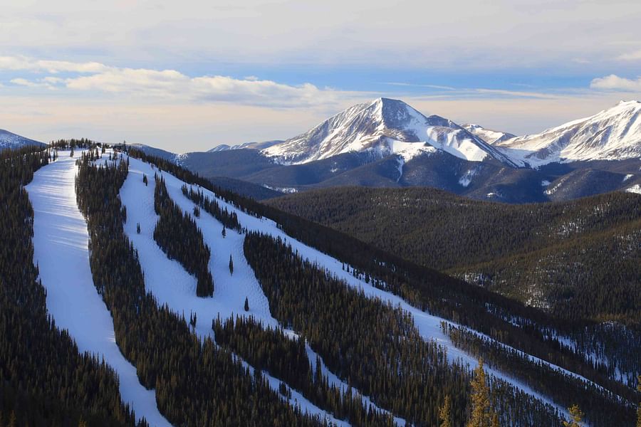 Panoramic view of a bustling ski resort in Colorado